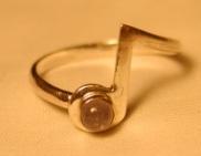 Eighth note ring with stone